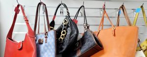 ladies designer handbags on display
